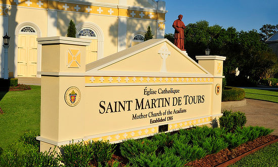 Sign at the St. Martin de Tours Catholic Church in St. Martinville, Louisiana